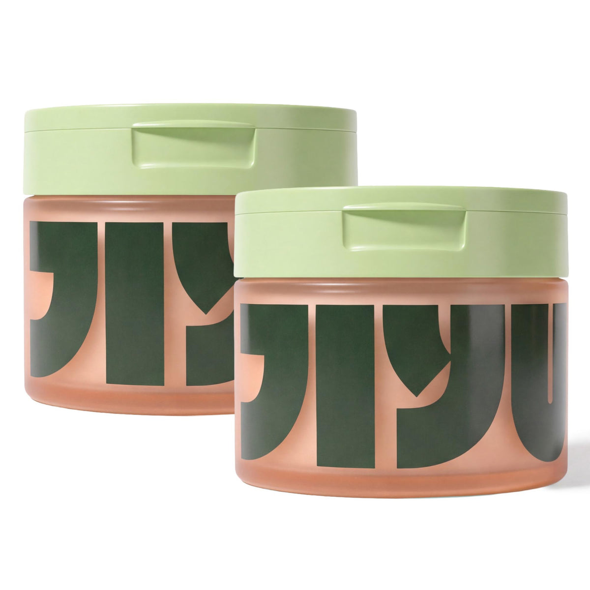 Two frosted peach jars of toner pads with light green flip-top lids, one set slightly behind the other