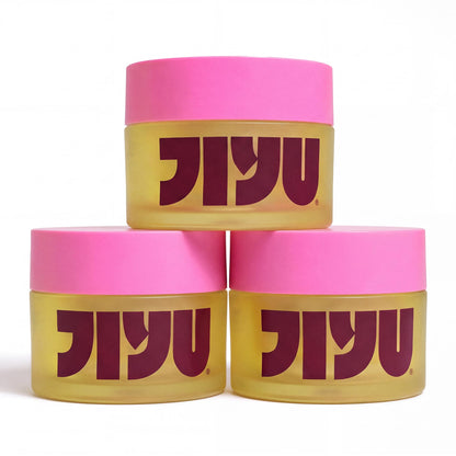 Three yellow frosted jars with pink lids and JIYU logos stacked in a pyramid