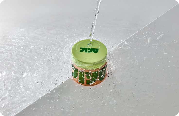 JiYu toner jar on wet surface